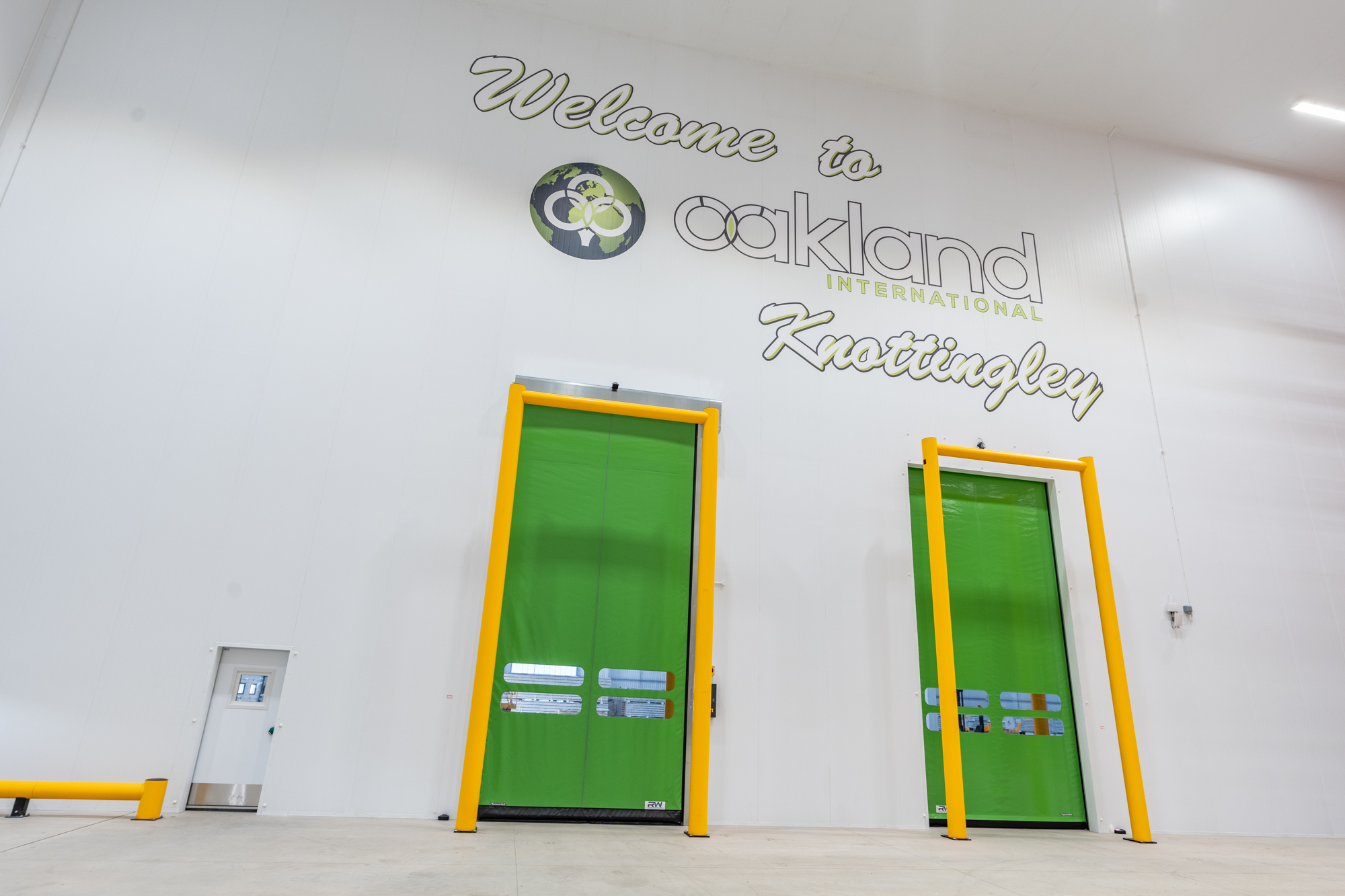 Rapid-roll doors within warehouse environment